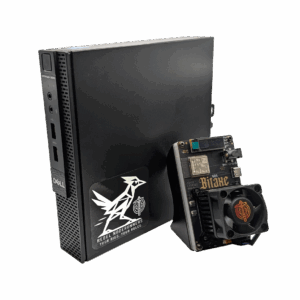 A Bitaxe Bitcoin Miner sitting on top of a small mini PC.