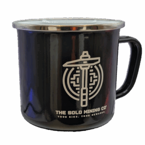 A black enamel mug with The Solo Mining Co's logo on it, which resembles a digital axe.